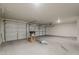 Spacious three-car garage with updated lighting and modern garage doors at 1726 E Primera Dr, Casa Grande, AZ 85122