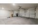 Spacious three car garage with multiple garage doors and concrete flooring at 1726 E Primera Dr, Casa Grande, AZ 85122