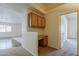 Convenient office nook with built-in desk and cabinets, leading to other rooms at 1726 E Primera Dr, Casa Grande, AZ 85122