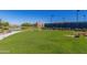 Community horseshoe pit near the lake, offering recreational activities at 17907 W Cedarwood Ln, Goodyear, AZ 85338