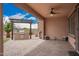 Outdoor kitchen on a covered patio, featuring a built-in grill and ample counter space for entertaining at 17907 W Cedarwood Ln, Goodyear, AZ 85338