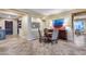 Charming dining area with a round table, cushioned chairs, and stylish furnishings at 19414 W Pasadena Ave, Litchfield Park, AZ 85340