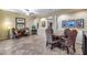 Open dining area with tile floors, traditional furnishings, and plenty of space for entertaining at 19414 W Pasadena Ave, Litchfield Park, AZ 85340