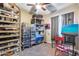 Creative hobby room with organized storage and a dedicated art easel, perfect for artists at 19414 W Pasadena Ave, Litchfield Park, AZ 85340