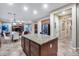 Spacious kitchen with a large island, perfect for cooking and entertaining guests at 19414 W Pasadena Ave, Litchfield Park, AZ 85340