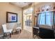 Comfortable office space with a view of the hallway and elegant, neutral decor at 19414 W Pasadena Ave, Litchfield Park, AZ 85340