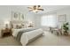 Calm, inviting bedroom with soft neutral tones, plush bedding, and natural light at 1945 W Renaissance Ave, Apache Junction, AZ 85120