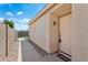 Inviting front entrance with security door and a well-maintained walkway at 1945 W Renaissance Ave, Apache Junction, AZ 85120