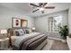 Comfortable bedroom with soft lighting, stylish decor, and a relaxing ambiance at 2006 N Arrowhead Dr, Chandler, AZ 85224
