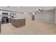 Updated kitchen featuring a large island, stainless steel appliances, and recessed lighting at 2006 N Arrowhead Dr, Chandler, AZ 85224