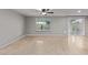 Spacious living room boasts neutral tile flooring and a large window for ample natural light at 2006 N Arrowhead Dr, Chandler, AZ 85224