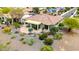 Backyard with desert landscaping, covered patio, and neat gravel accents providing a serene outdoor living space at 20642 N 268Th Dr, Buckeye, AZ 85396