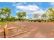 Community horseshoe pit featuring wood trim around each of the sandy court areas at 20642 N 268Th Dr, Buckeye, AZ 85396