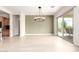Bright dining area featuring sliding glass doors to the outdoor patio at 20642 N 268Th Dr, Buckeye, AZ 85396