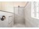 Contemporary shower with gray tiling, glass partition, and built-in niche at 20642 N 268Th Dr, Buckeye, AZ 85396