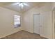 Bedroom with plush carpet and a closet for storage and organization at 2312 E Williams Dr, Phoenix, AZ 85024