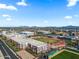 An elevated view features the campus, track and field, and mountain views in the distance at 3107 W Tuckey Ln, Phoenix, AZ 85017