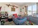 Colorful bedroom featuring a twin size bed, dresser and large window at 3107 W Tuckey Ln, Phoenix, AZ 85017
