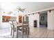 Open dining area with neutral decor and access to the kitchen at 3107 W Tuckey Ln, Phoenix, AZ 85017