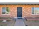 Close-up of the front entrance showcasing the brickwork and secure front door at 3107 W Tuckey Ln, Phoenix, AZ 85017