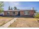 Charming single-story brick home with a well-maintained front yard and walkway at 3107 W Tuckey Ln, Phoenix, AZ 85017