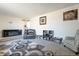 Bright living room featuring comfortable seating, decor and lots of open space at 3107 W Tuckey Ln, Phoenix, AZ 85017