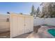 Pool shed with concrete and partially visible pool at 3107 W Tuckey Ln, Phoenix, AZ 85017