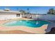Backyard swimming pool surrounded by patio and white fencing at 3107 W Tuckey Ln, Phoenix, AZ 85017