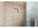 Updated walk-in shower with tiled walls, handheld sprayer and a built-in soap niche at 3107 W Tuckey Ln, Phoenix, AZ 85017