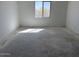 Bedroom featuring neutral wall, and a window providing ample natural light at 32677 N Newby Dr, San Tan Valley, AZ 85143
