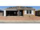 New construction home featuring an attached two-car garage and a partially installed roof at 32677 N Newby Dr, San Tan Valley, AZ 85143