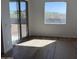 Living room featuring sliding glass doors leading to an outdoor area with views of hills at 32677 N Newby Dr, San Tan Valley, AZ 85143