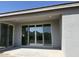 Covered patio area with sliding glass doors offering views of the backyard at 32677 N Newby Dr, San Tan Valley, AZ 85143