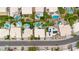Aerial view of property and community showcasing sparkling pools, mature trees and landscaping at 3440 E Topeka Dr, Phoenix, AZ 85050