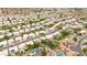 Overhead view of a desert neighborhood and curved streets at 3440 E Topeka Dr, Phoenix, AZ 85050