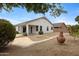 Rear exterior with low maintenance desert landscaping at 35656 N Shorthorn Trl, San Tan Valley, AZ 85143