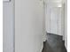 Hallway with contrasting walls and black marble flooring at 35656 N Shorthorn Trl, San Tan Valley, AZ 85143