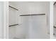 Walk-in closet with shelves and hanging rods at 35656 N Shorthorn Trl, San Tan Valley, AZ 85143