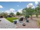 Paver patio and artificial turf yard provides low-maintenance outdoor living space at 35773 N Loemann Dr, San Tan Valley, AZ 85143