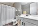 Bright bathroom featuring a double sink vanity and glass enclosed shower at 35773 N Loemann Dr, San Tan Valley, AZ 85143