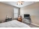 Bedroom featuring a ceiling fan, carpeted floors, and cozy furnishings at 35773 N Loemann Dr, San Tan Valley, AZ 85143