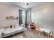 Charming bedroom with bed, play furniture and soft carpet at 35773 N Loemann Dr, San Tan Valley, AZ 85143