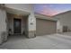 Charming home with a well-manicured lawn, a two-car garage, and a welcoming entrance at 35773 N Loemann Dr, San Tan Valley, AZ 85143