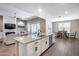 Gourmet kitchen island overlooking the dining and living areas at 35773 N Loemann Dr, San Tan Valley, AZ 85143