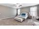 Bright main bedroom with a plush king size bed and neutral decor at 35773 N Loemann Dr, San Tan Valley, AZ 85143