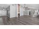 Spacious living room with vaulted ceilings, fireplace, and wood-look tile flooring at 3822 E Florian Ave, Mesa, AZ 85206
