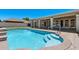 Inviting swimming pool with tile steps, set in a well-maintained backyard at 3822 E Florian Ave, Mesa, AZ 85206