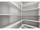 Walk-in pantry with ample shelving and storage space at 3822 E Florian Ave, Mesa, AZ 85206