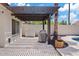 Outdoor patio with pergola, barbecue, jacuzzi and view of the pool at 4107 W Mariposa Grande --, Glendale, AZ 85310