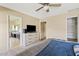 Bedroom featuring carpet, TV on dresser, with an ensuite bathroom and walk-in closet visible through doorways at 4107 W Mariposa Grande --, Glendale, AZ 85310